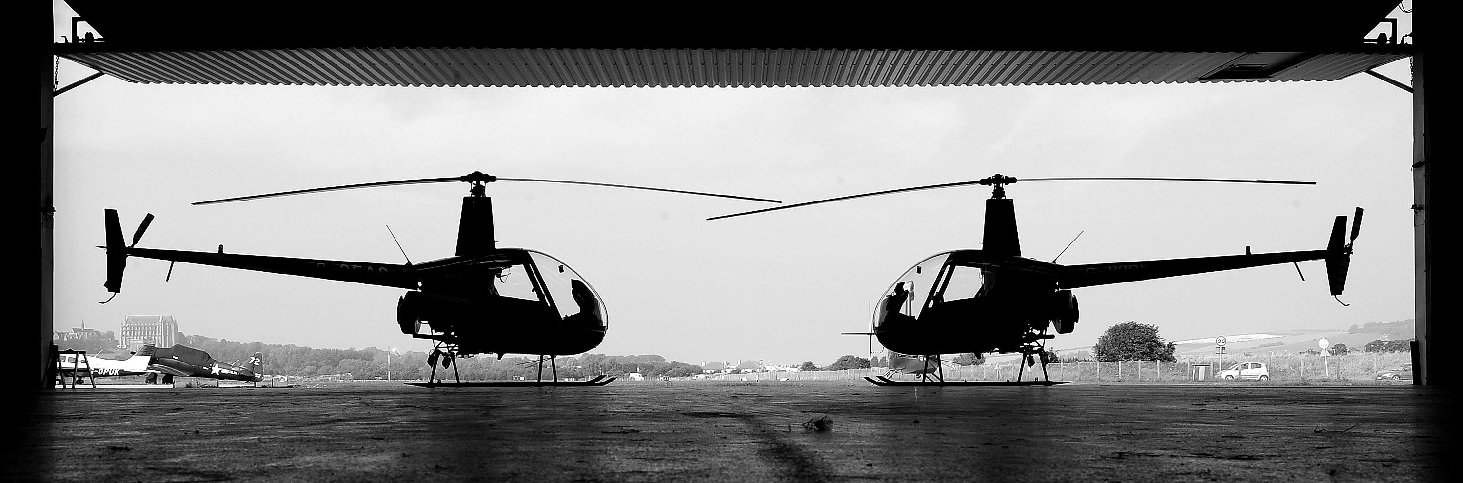 Two R22 helicopters